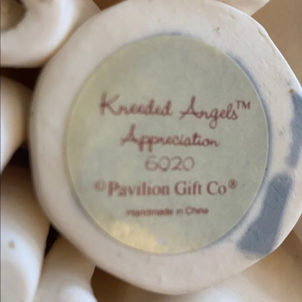 Kneeded Angel Figurine with Pastel Floral Bouquet